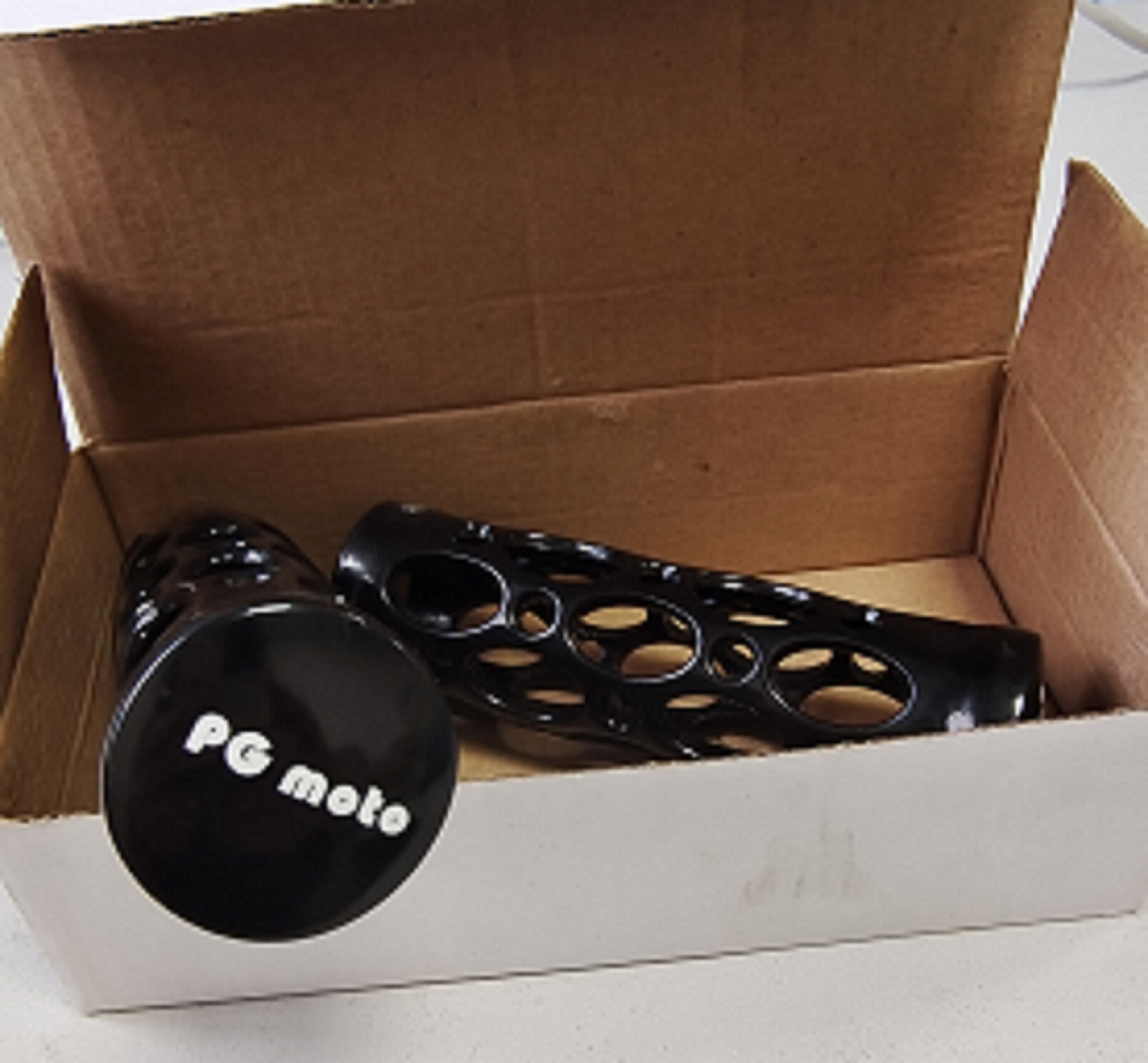 BLACK PIERCED HAND GRIPS